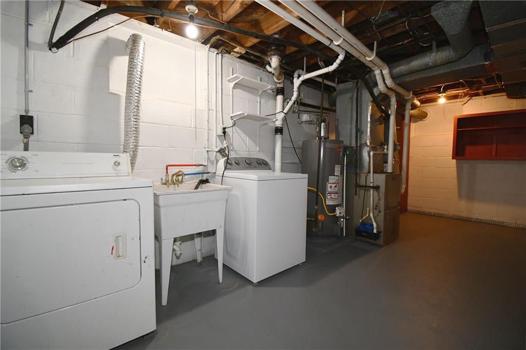 217 Oaklyn Road Bethel Park, PA 15102 - Photo 42 of 42 a utility room with dryer and washer