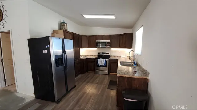 a bedroom with furniture and a ceiling fan