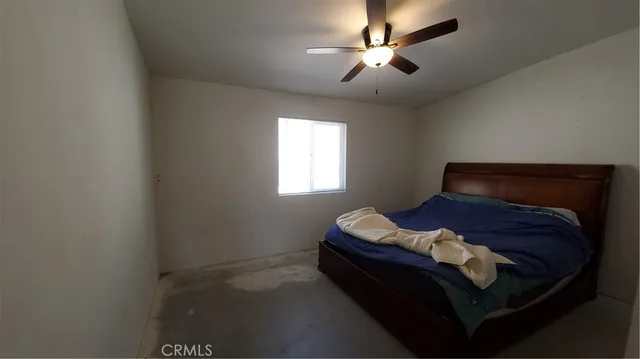 a view of a house with a snow in the background