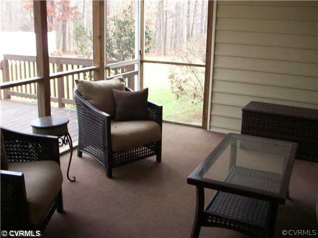 8244 White Oak Road Ford, VA 23850 - Photo 18 of 24 a living room with furniture and a window