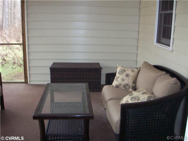 8244 White Oak Road Ford, VA 23850 - Photo 19 of 24 a living room with furniture and a window