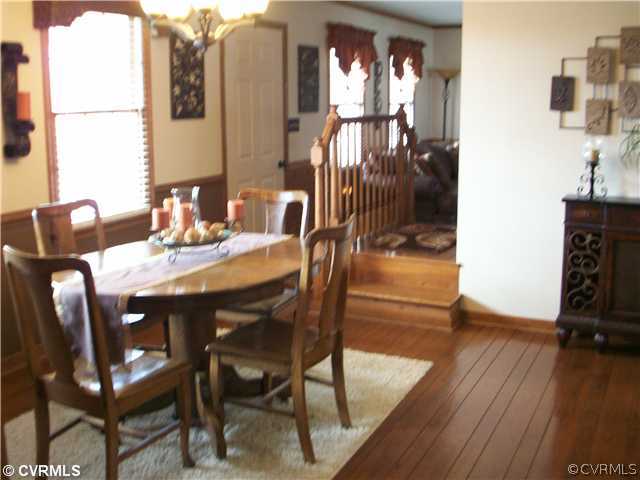 8244 White Oak Road Ford, VA 23850 - Photo 6 of 24 a dining room with furniture and wooden floor