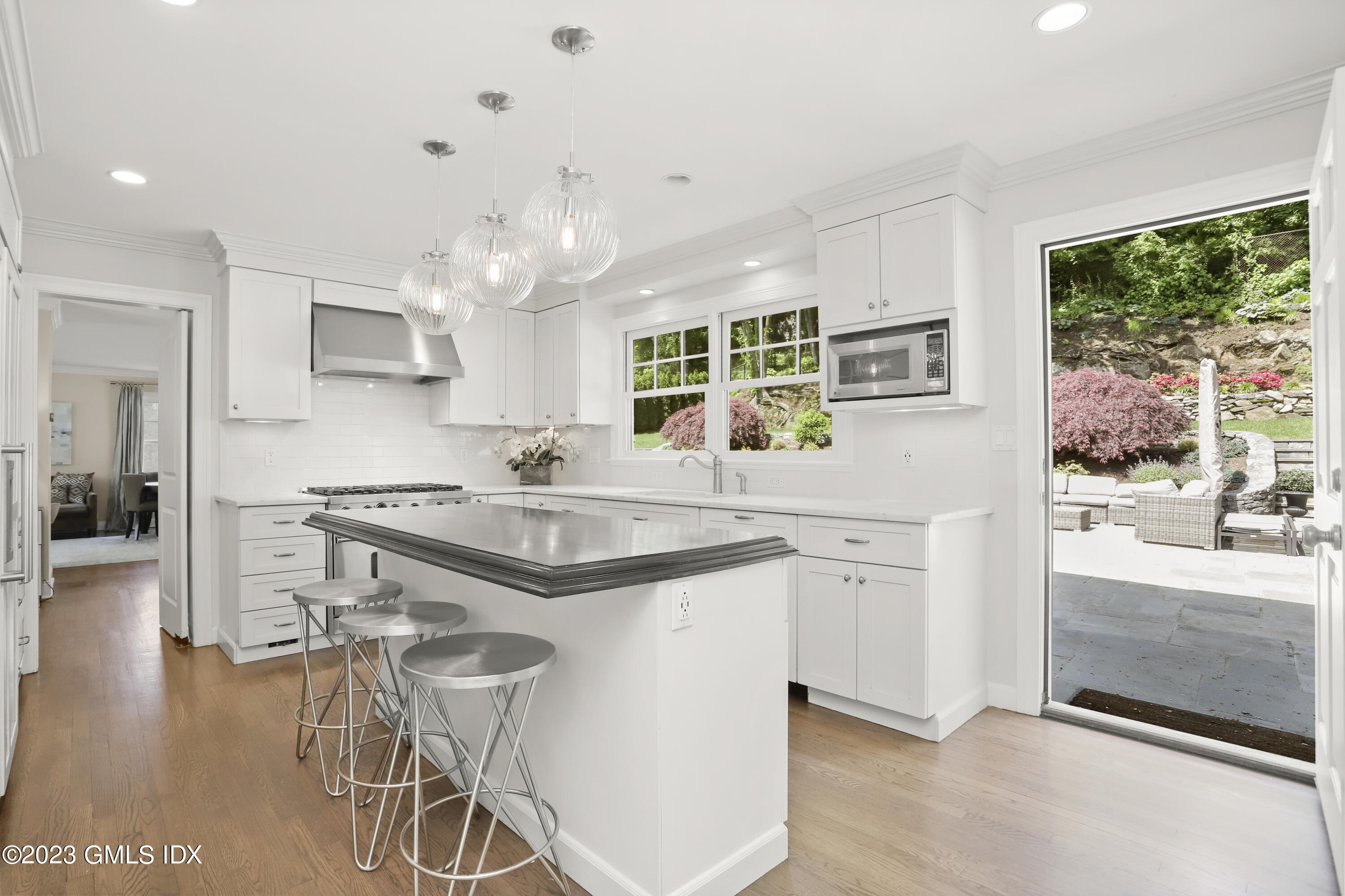 85 Mallard Drive Greenwich, CT 06830 - Photo 11 of 40 a kitchen with stainless steel appliances granite countertop a stove and a refrigerator
