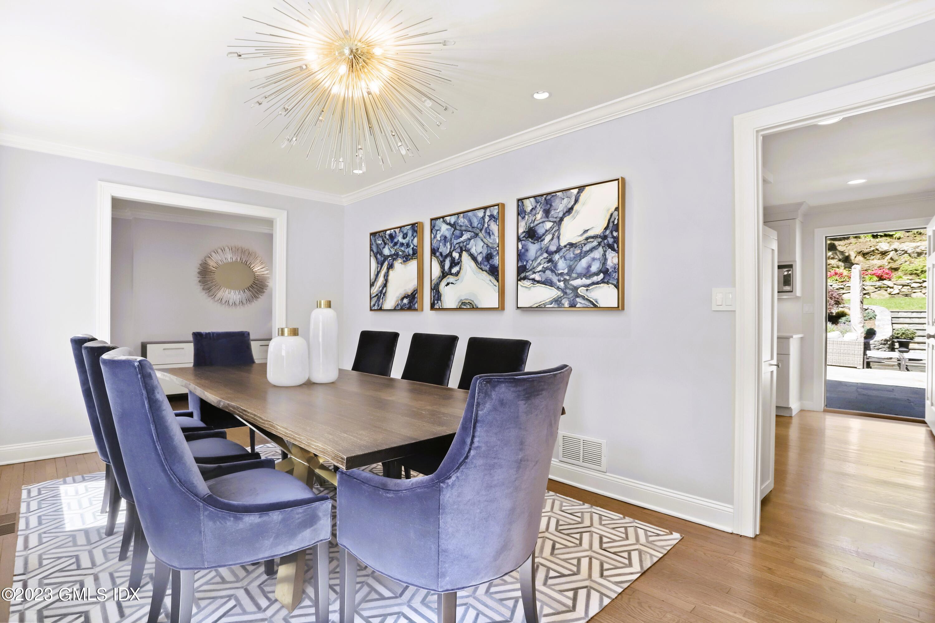 85 Mallard Drive Greenwich, CT 06830 - Photo 17 of 40 a view of a dining room with furniture and wooden floor