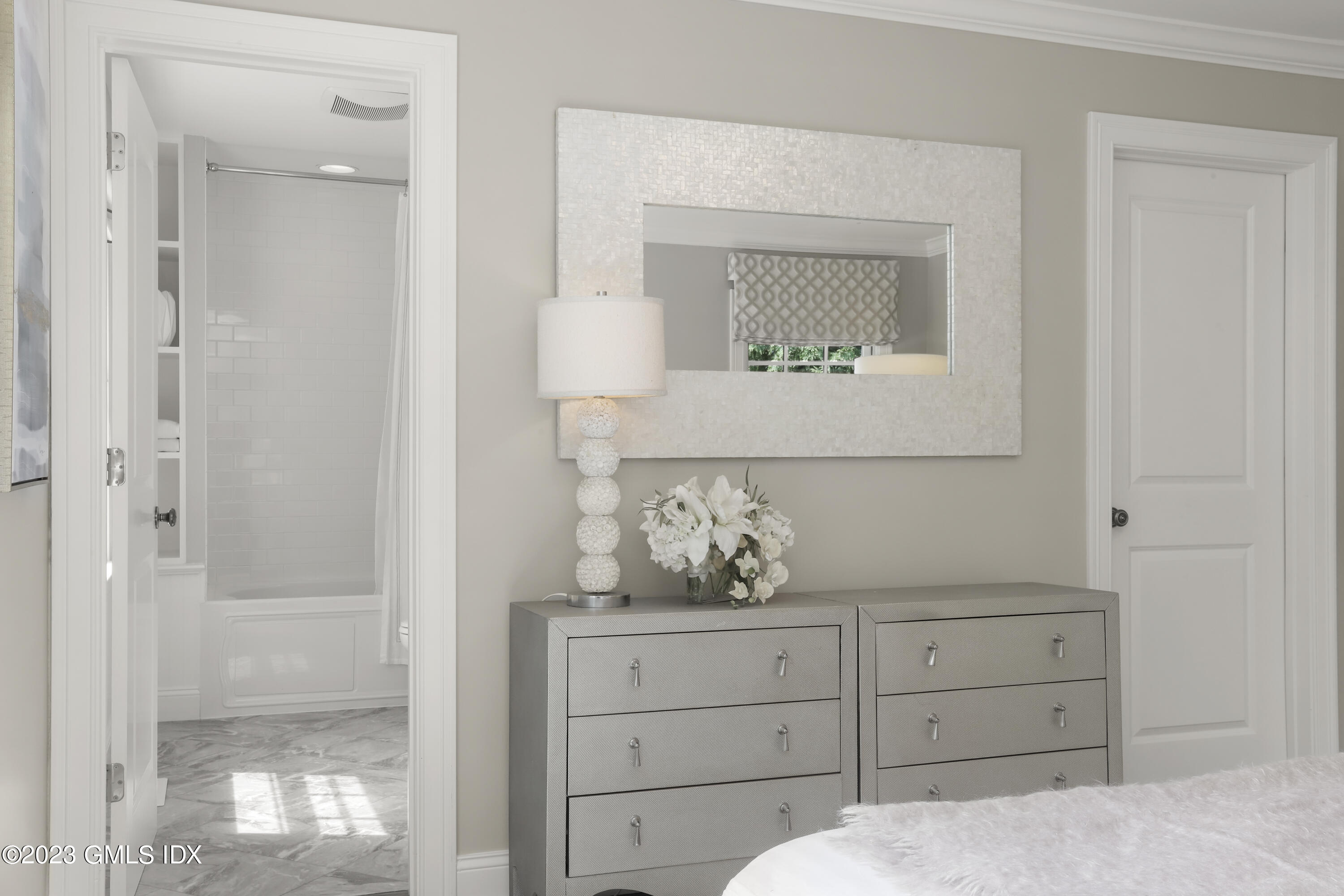 85 Mallard Drive Greenwich, CT 06830 - Photo 22 of 40 a bathroom with a bathtub sink and mirror