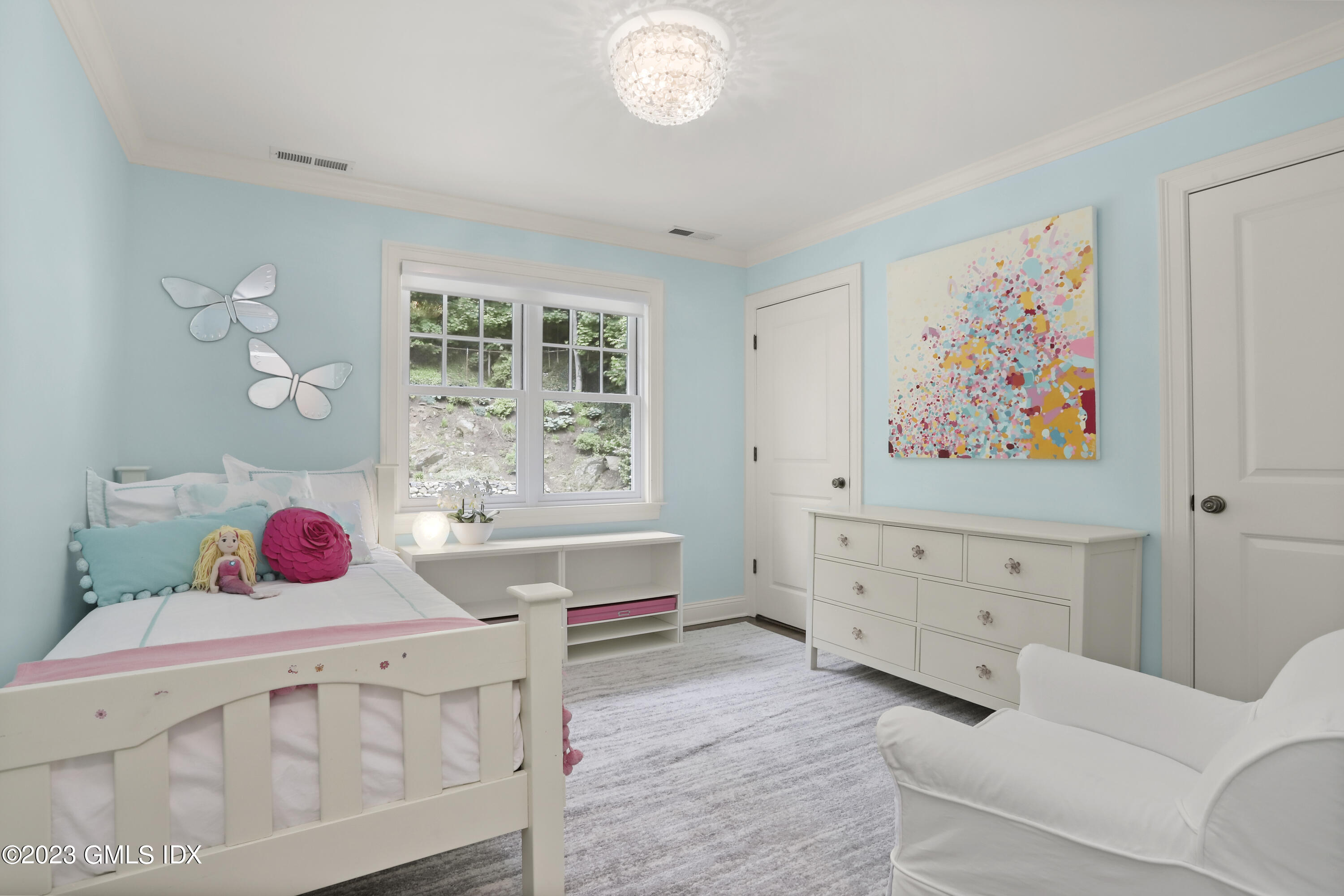 85 Mallard Drive Greenwich, CT 06830 - Photo 27 of 40 a bedroom with furniture and a window