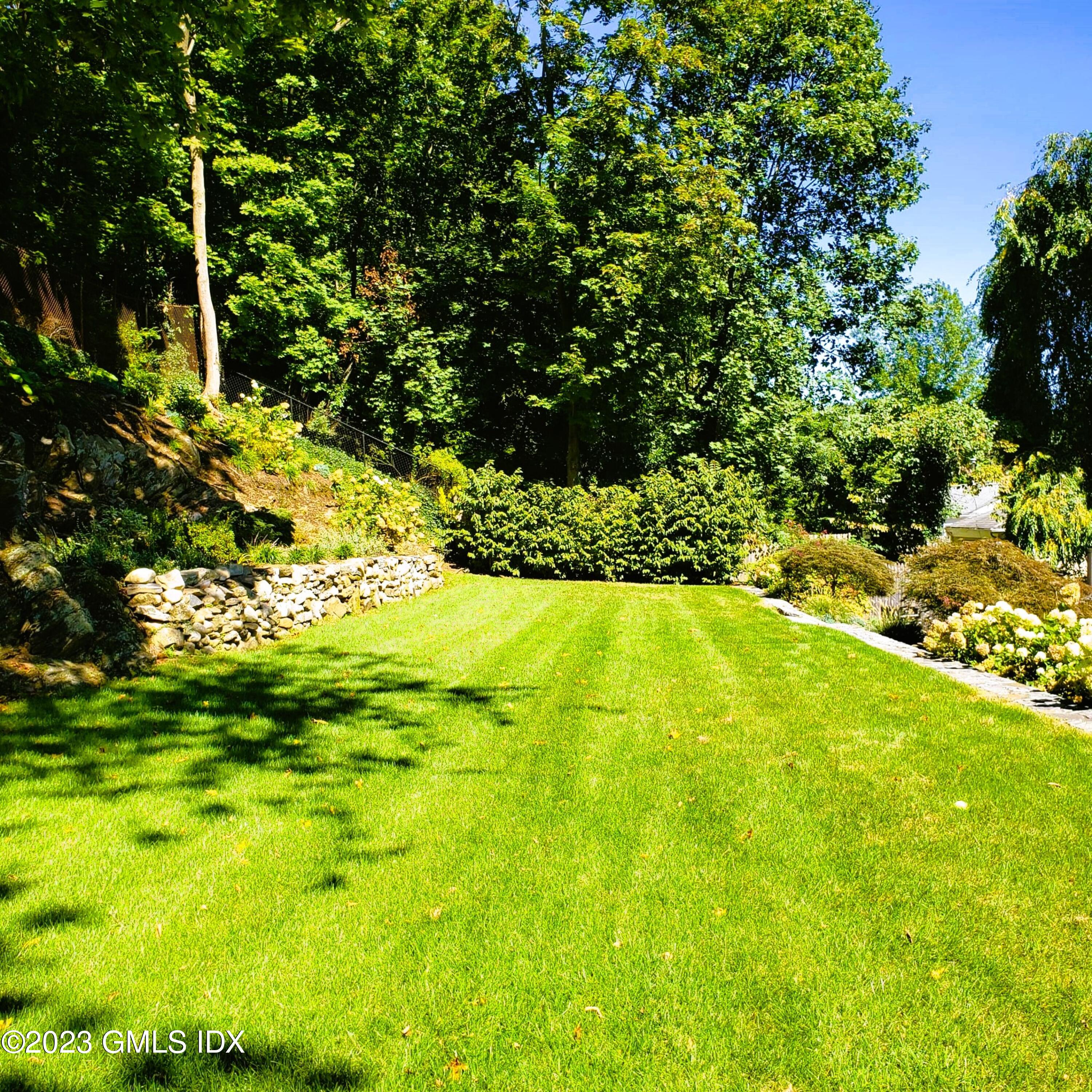 85 Mallard Drive Greenwich, CT 06830 - Photo 34 of 40 a view of yard with green space