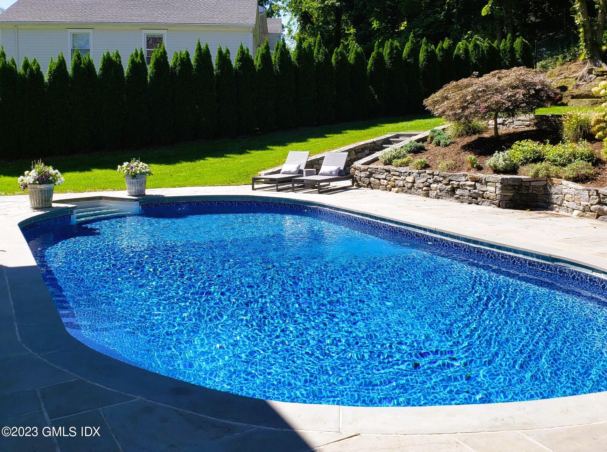 85 Mallard Drive Greenwich, CT 06830 - Photo 35 of 40 a view of a back yard with green space