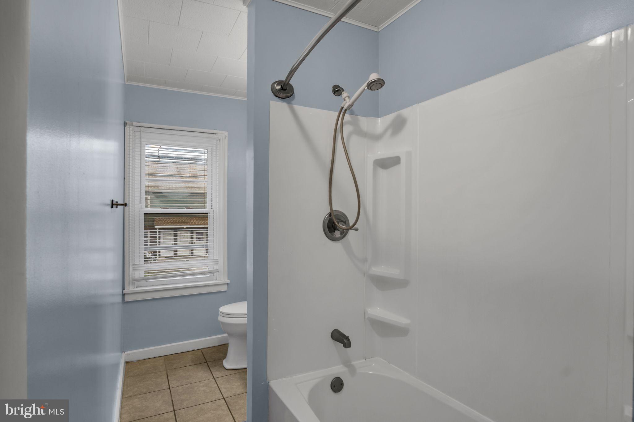 27 South Spring Garden Street Carlisle, PA 17013 - Photo 15 of 26 a bathroom with a bath tub and a shower