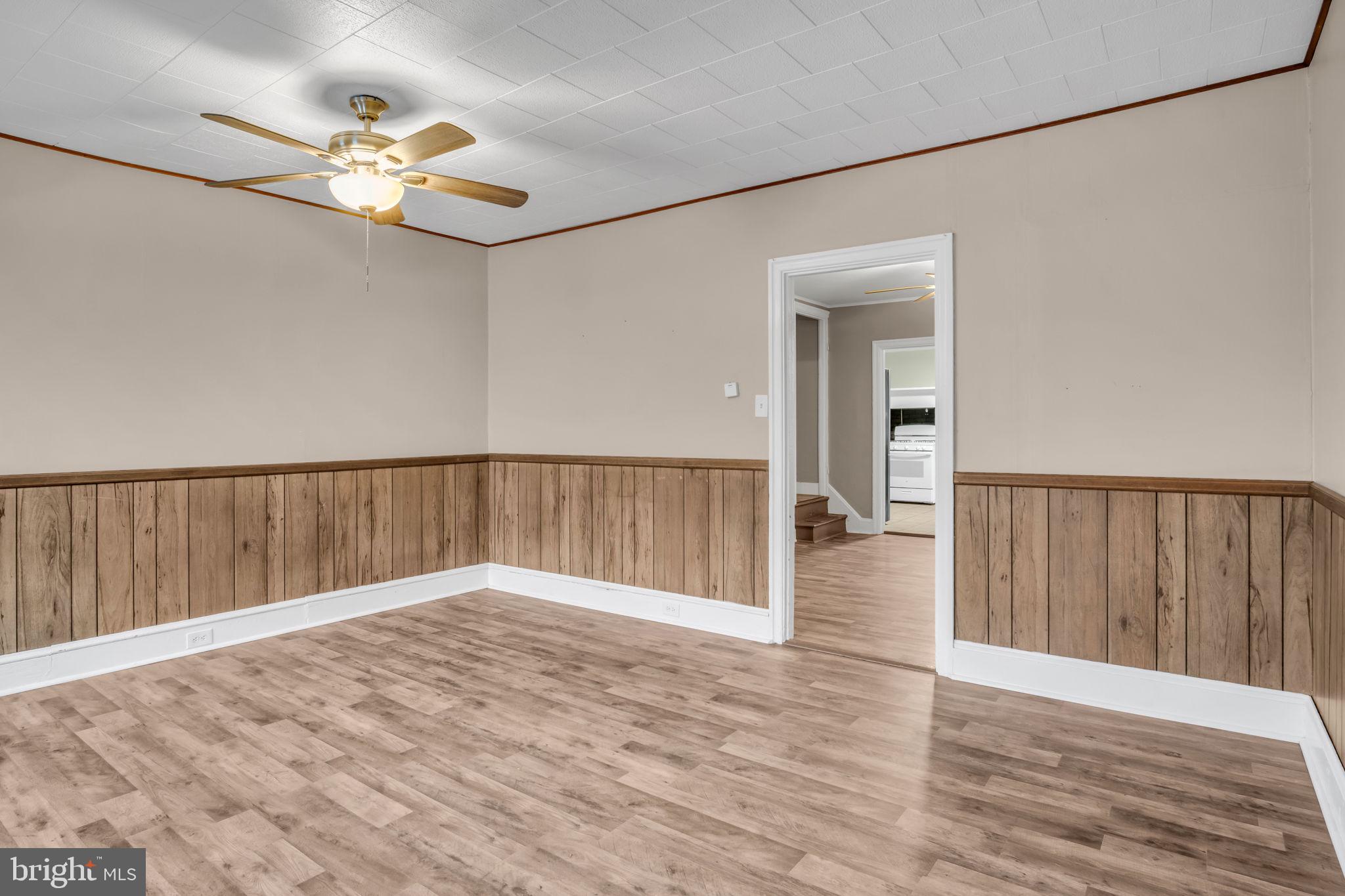 27 South Spring Garden Street Carlisle, PA 17013 - Photo 3 of 26 a view of an empty room with wooden floor