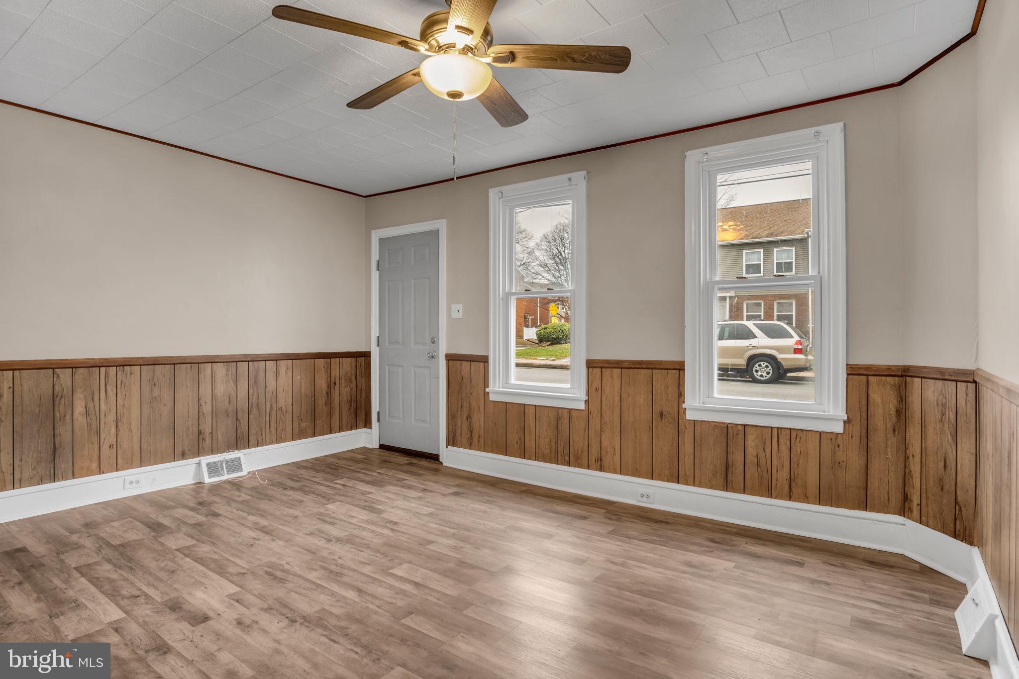 27 South Spring Garden Street Carlisle, PA 17013 - Photo 4 of 26 wooden floor in an empty room with a window