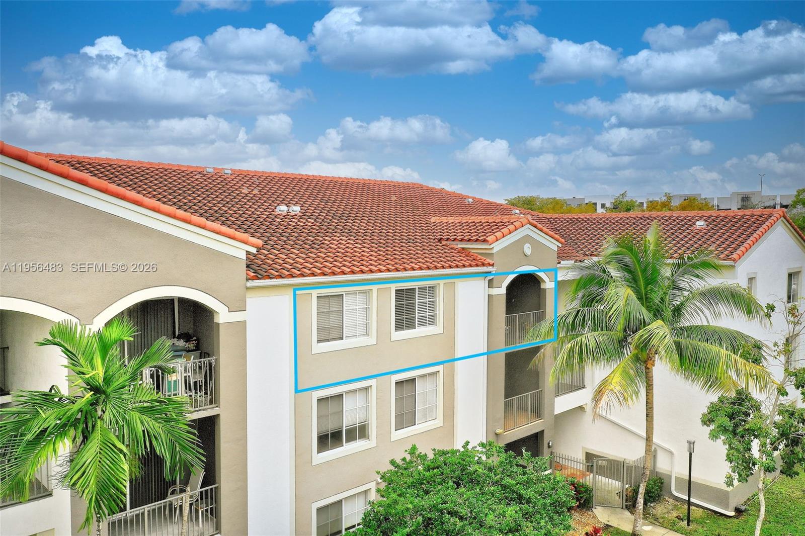 6831 Southwest 44th Street, Unit 304 Miami, FL 33155 - Photo 18 of 27 a front view of a house with balcony