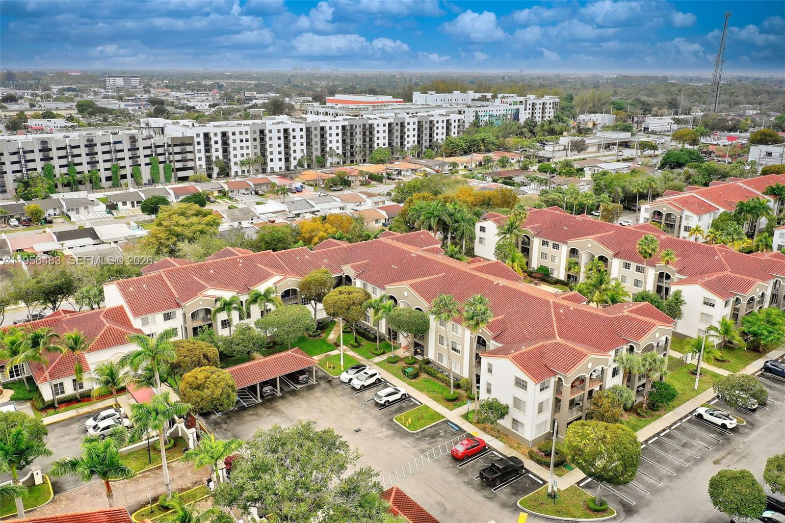 6831 Southwest 44th Street, Unit 304 Miami, FL 33155 - Photo 22 of 27 an aerial view of residential houses and outdoor space