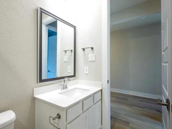 a bathroom with a sink and a toilet