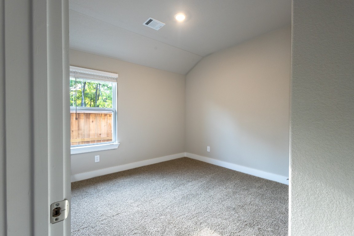 2010 Bluff Oak Street Conroe, TX 77304 - Photo 15 of 35 an empty room with a window