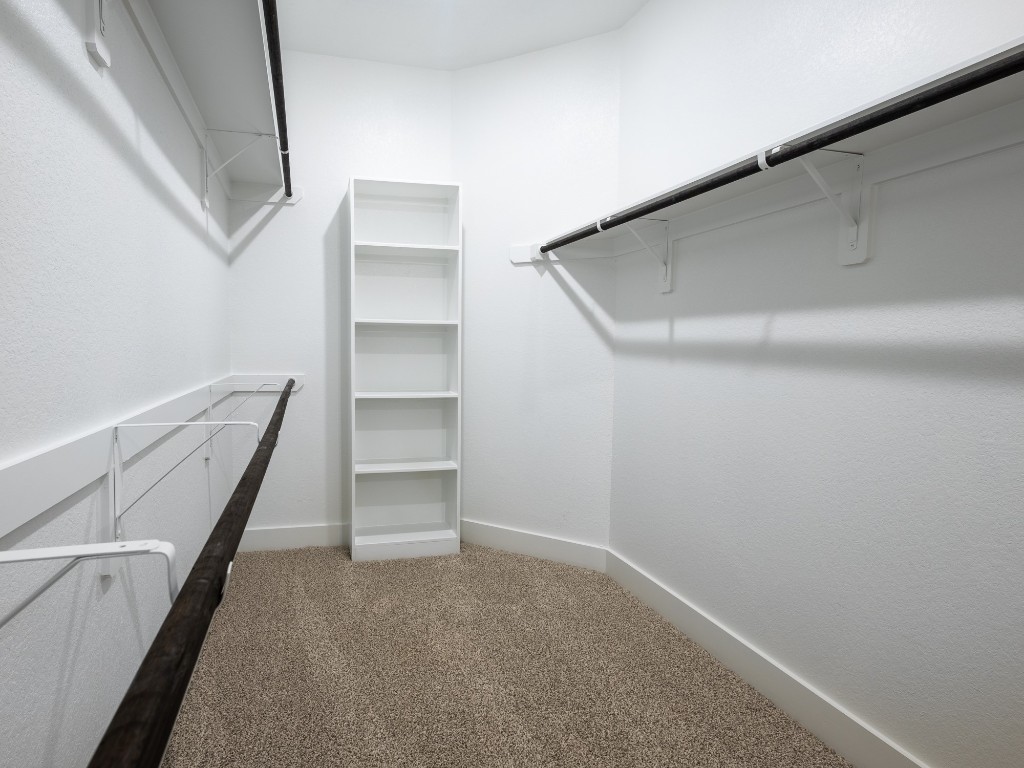 2010 Bluff Oak Street Conroe, TX 77304 - Photo 26 of 35 a view of an empty walk in closet