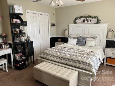 3474 Maiden Springs Road Maiden, NC 28650 - Photo 10 of 30 a bedroom with a bed a couch and dresser