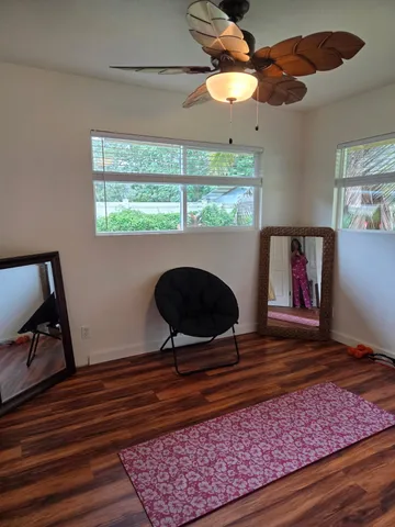 a bathroom with a toilet a sink and a shower
