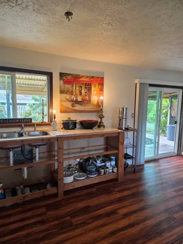 a kitchen with a sink and a stove