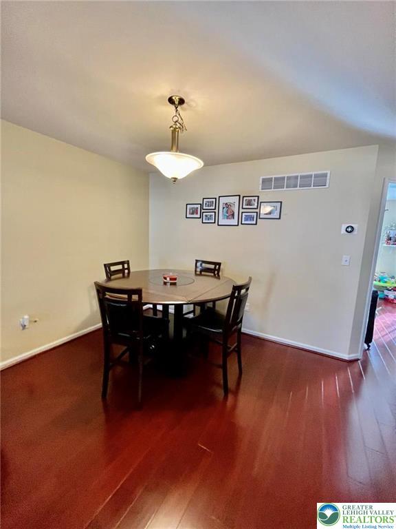 4164 Ross Road Bethlehem, PA 18020 - Photo 5 of 13 a view of a dining room with furniture and wooden floor