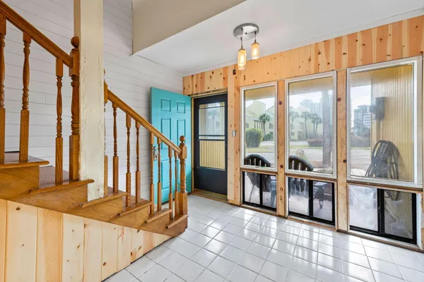 a view of a house with a door and a window