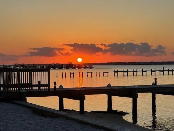 a view of swimming pool with sunset view