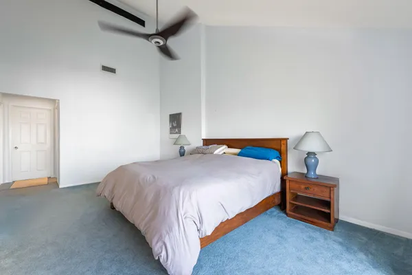 an outdoor view of the house with outdoor seating