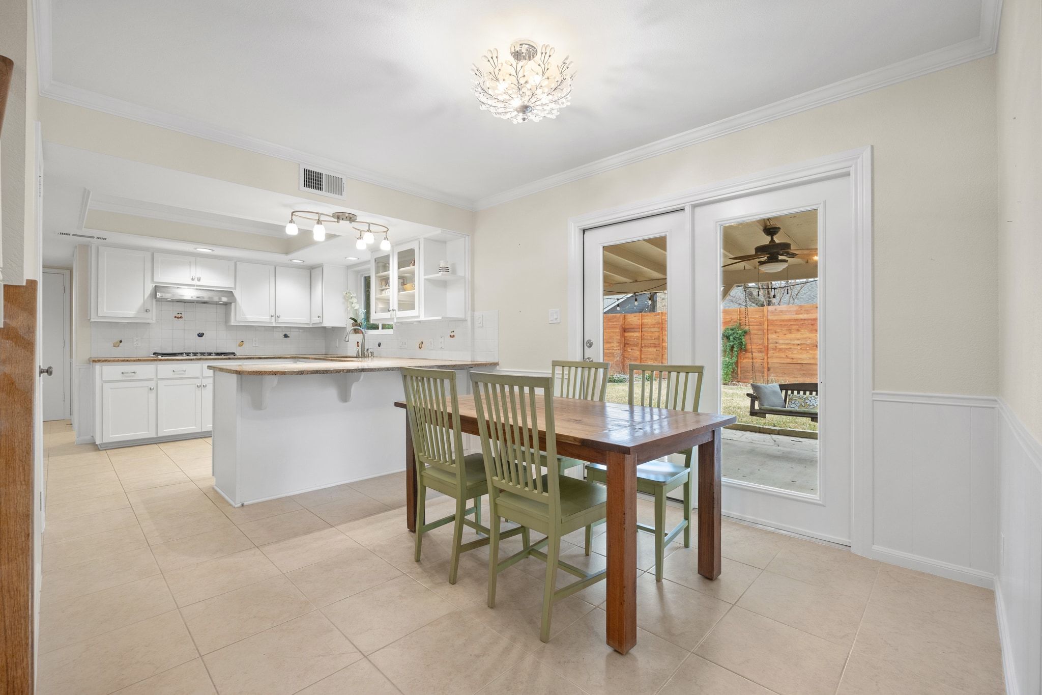 11204 Deadoak Lane Austin, TX 78759 - Photo 20 of 40 a dining room with furniture and window
