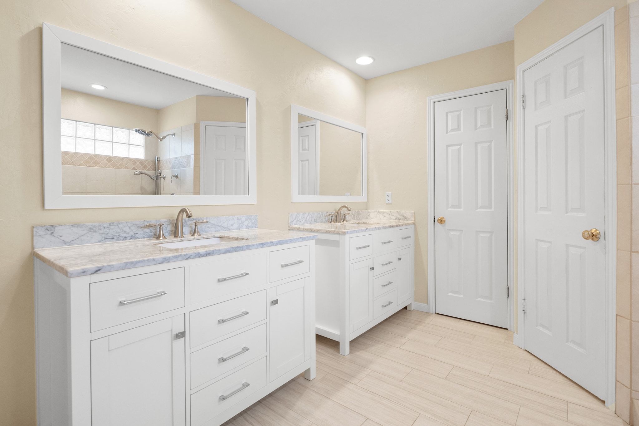 11204 Deadoak Lane Austin, TX 78759 - Photo 25 of 40 a spacious bathroom with a granite countertop sink mirror and a