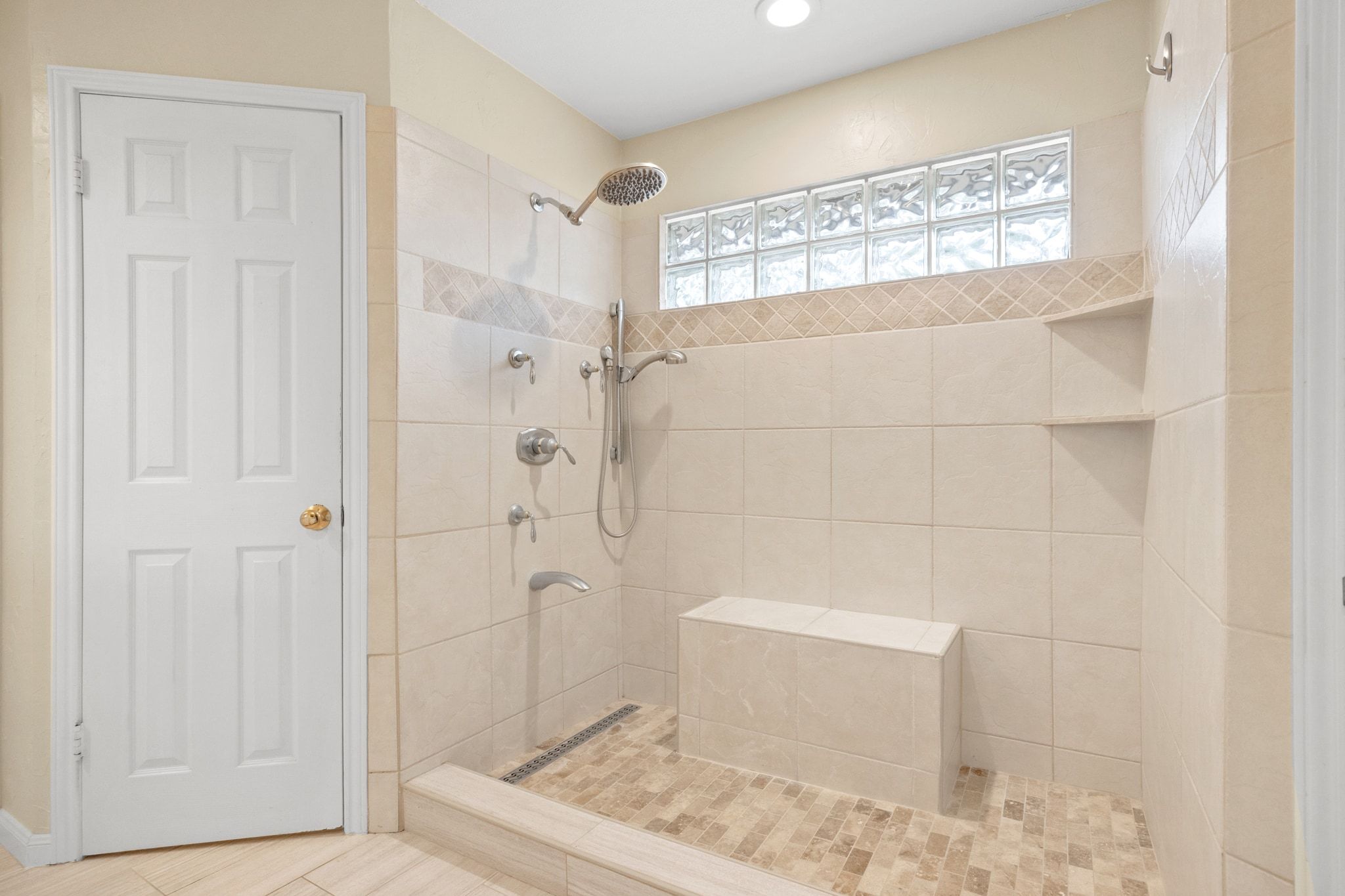 11204 Deadoak Lane Austin, TX 78759 - Photo 26 of 40 a bathroom with a toilet and shower