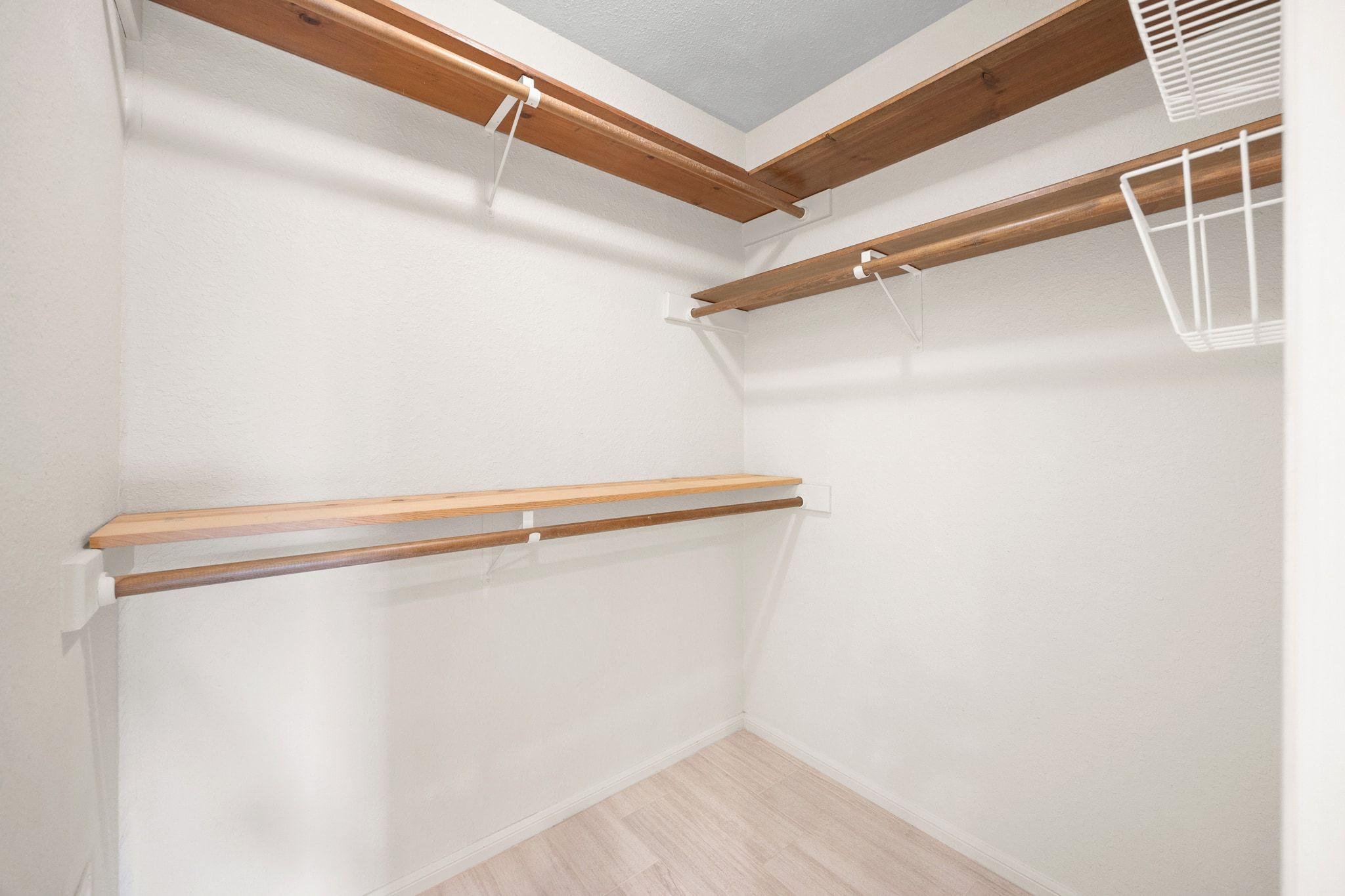 11204 Deadoak Lane Austin, TX 78759 - Photo 27 of 40 a view of an empty walk in closet
