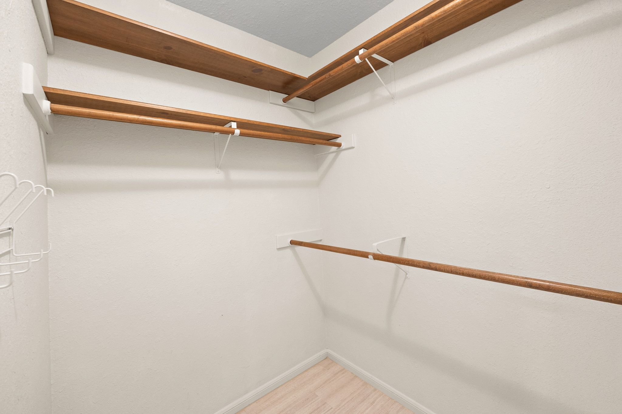 11204 Deadoak Lane Austin, TX 78759 - Photo 28 of 40 a view of a room with racks on the wall