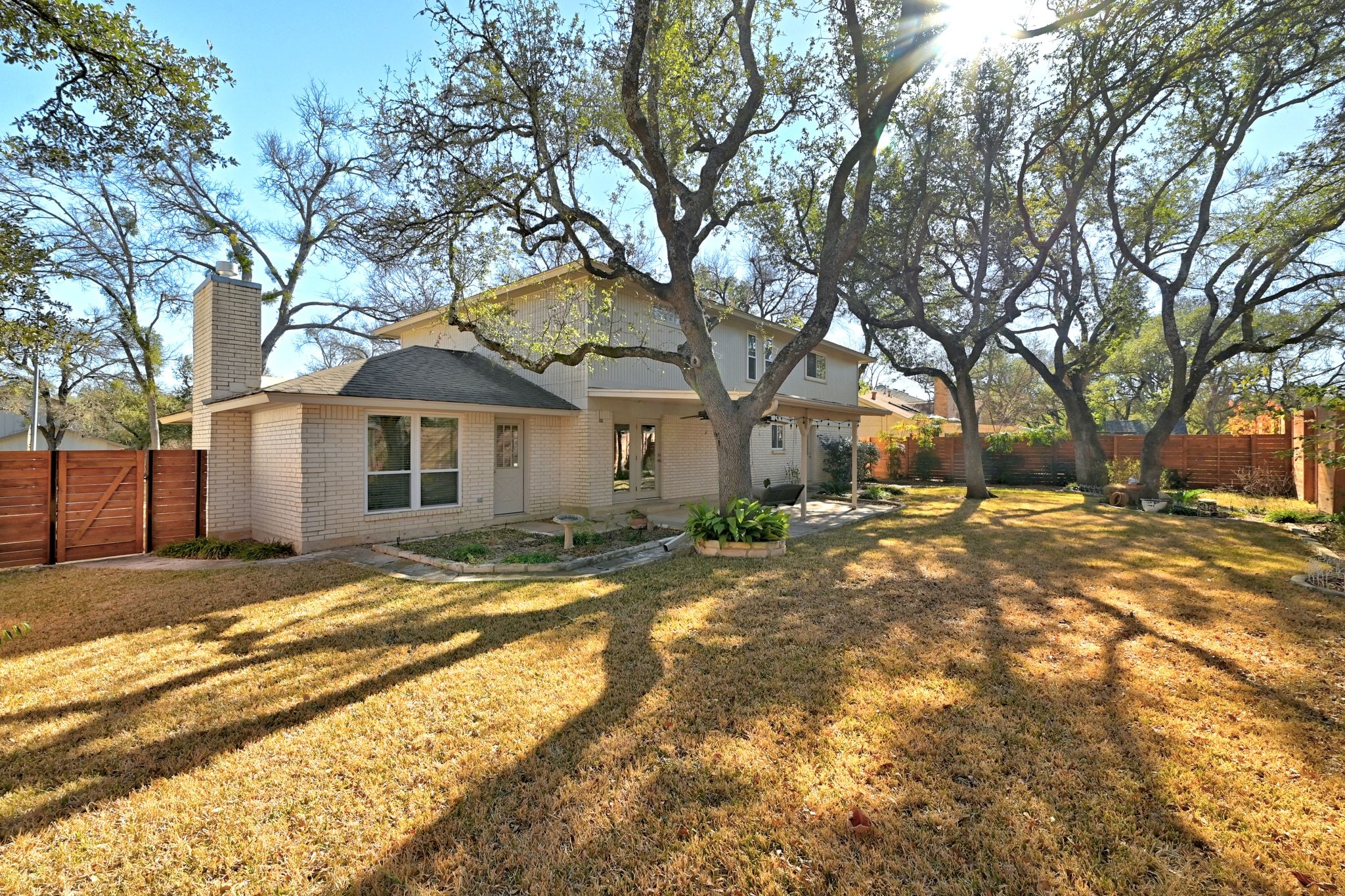 11204 Deadoak Lane Austin, TX 78759 - Photo 36 of 40 a view of a yard with a large tree