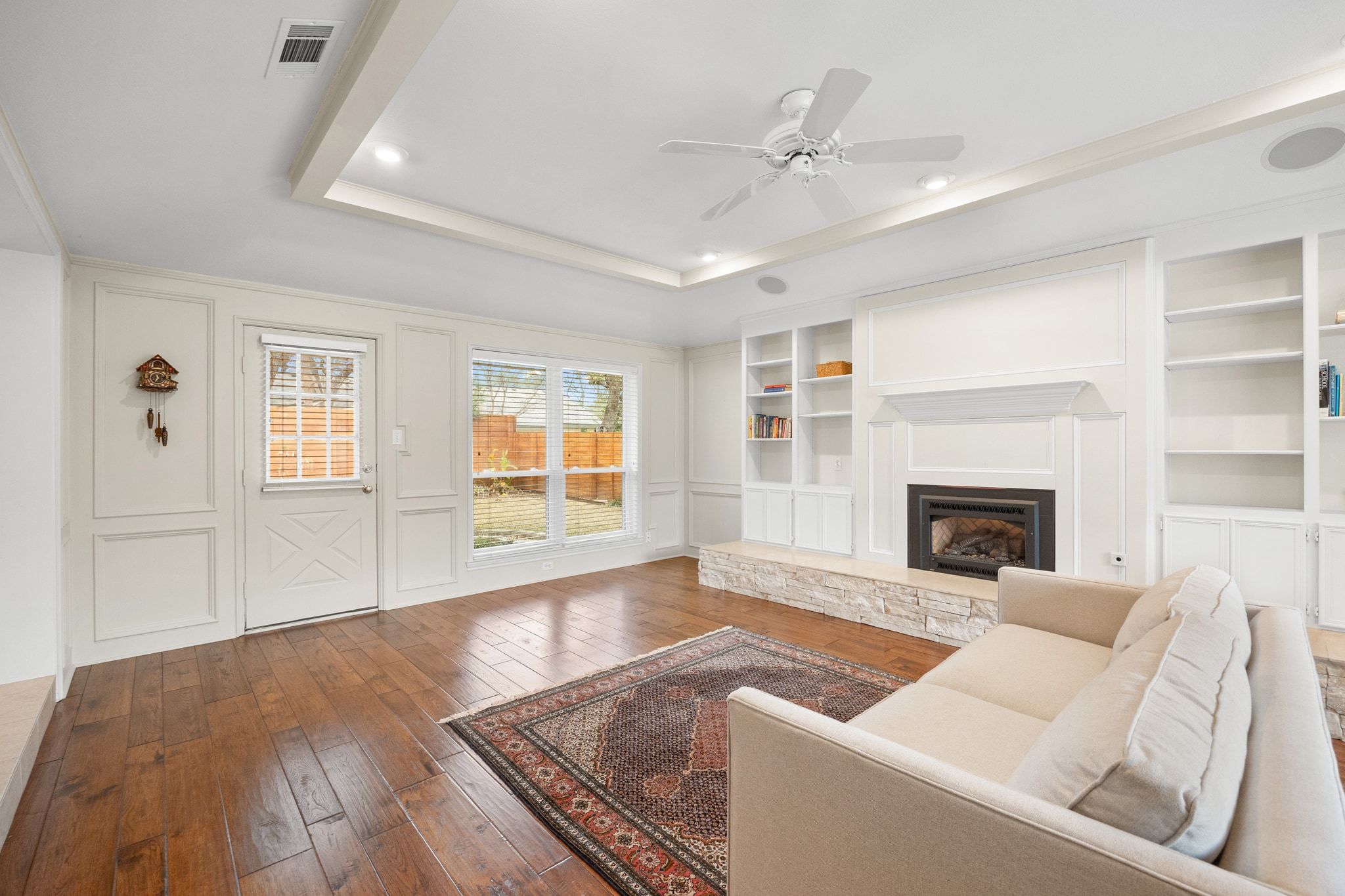 11204 Deadoak Lane Austin, TX 78759 - Photo 9 of 40 a living room with furniture and a fireplace