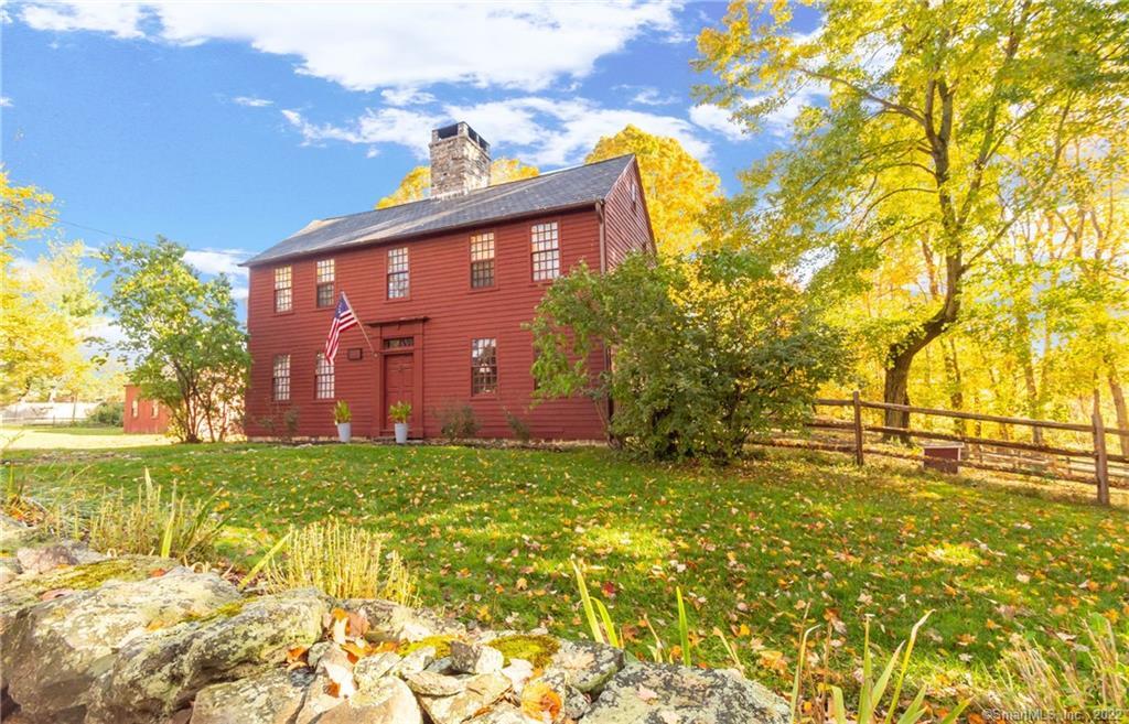 Stunning Vintage Saltbox Colonial in lush mature surroundings