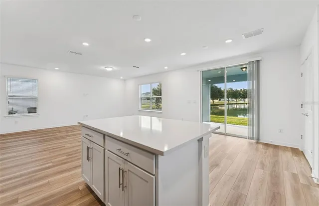 a kitchen with a sink and a window