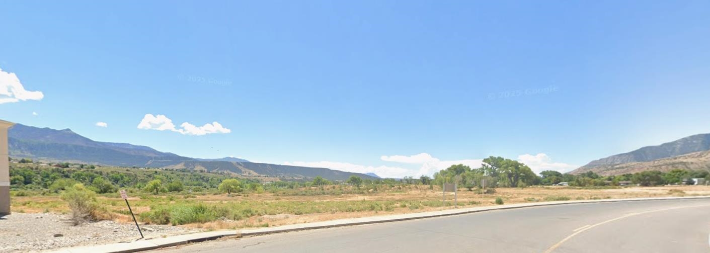 Tbd Cardinal Way Parachute, CO 81635 - Photo 3 of 8 a view of a city from a balcony