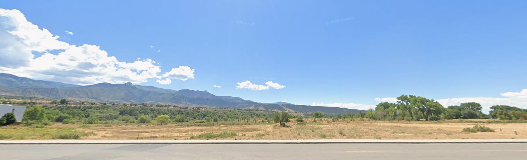 Tbd Cardinal Way Parachute, CO 81635 - Photo 4 of 8 a view of a lake with a mountain