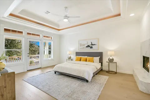 a bedroom with a large bed and a window