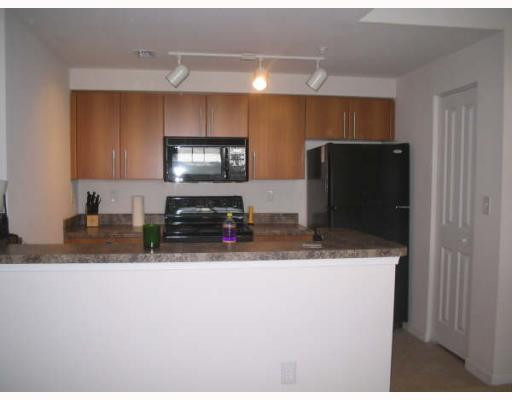 5920 West Sample Road, Unit 7308 Coral Springs, FL 33067 - Photo 3 of 7 Exterior Front