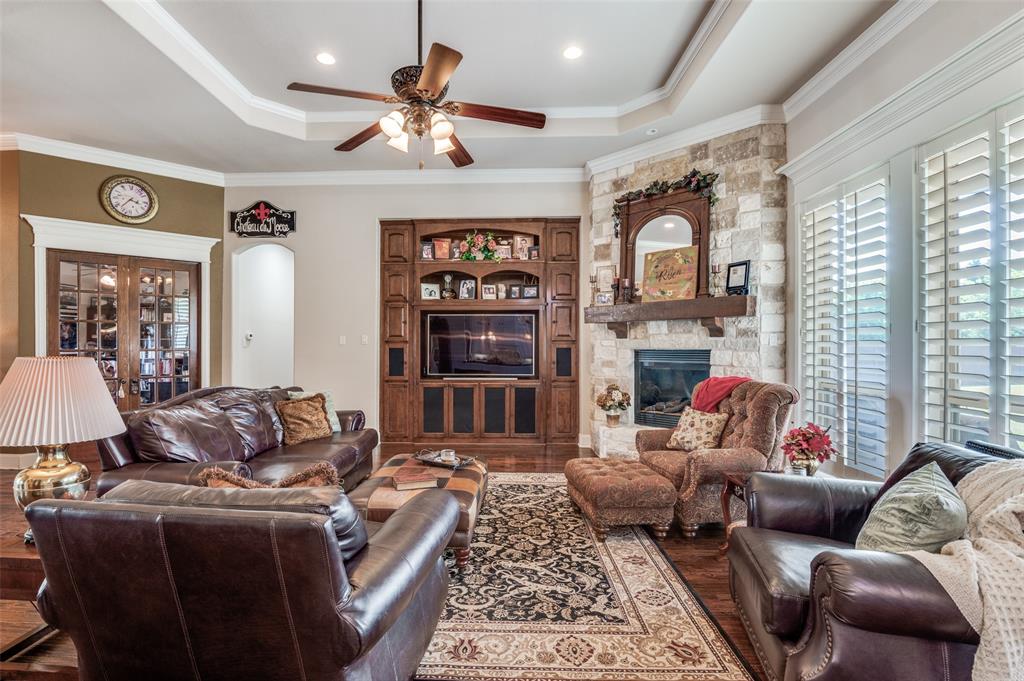 4041 Blackchamp Road Midlothian, TX 76065 - Photo 11 of 34 Study off to the left, hall to secondary bedrooms, built ins, gas log stone fireplace!
