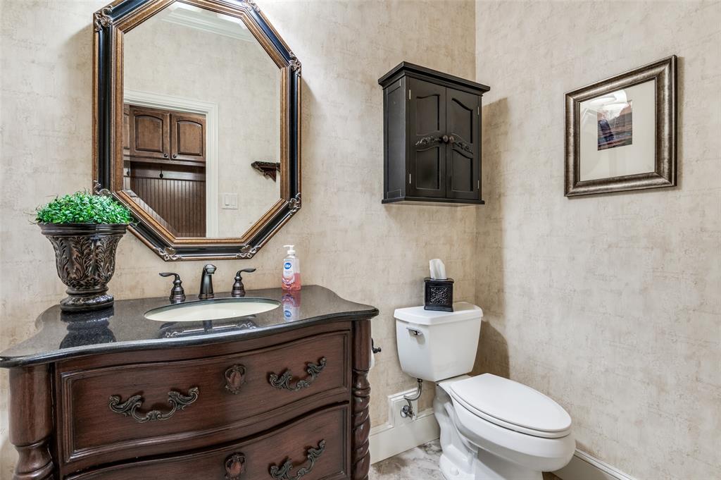 4041 Blackchamp Road Midlothian, TX 76065 - Photo 12 of 34 Good size half bath for guest just off the hall to the garage and mud room area!