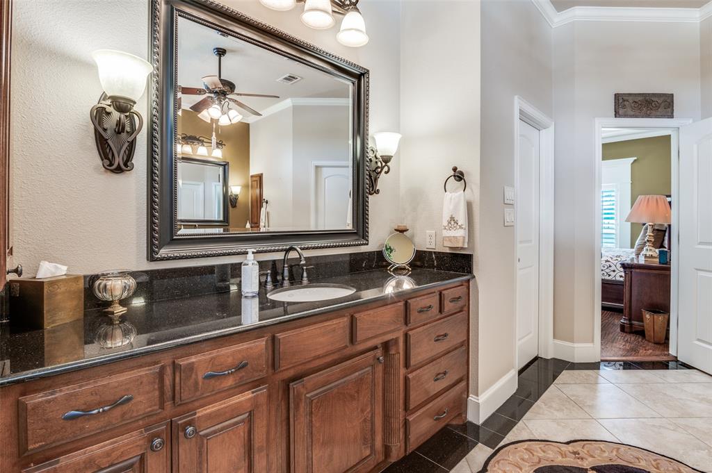 4041 Blackchamp Road Midlothian, TX 76065 - Photo 16 of 34 Lots of counter space, linen closet, granite tops and decorative mirrors.
