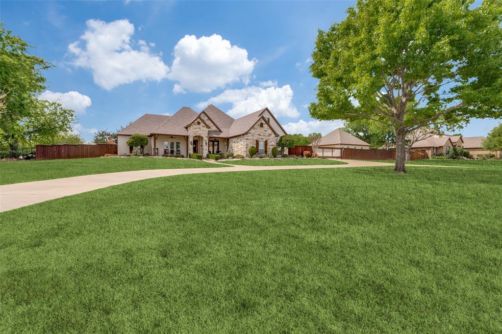 4041 Blackchamp Road Midlothian, TX 76065 - Photo 2 of 34 Circle drive for lots of extra parking. No HOA! Close to Midlothian and Waxahachie! Gated entry to four car garage and workshop! Lots of great executive home features!