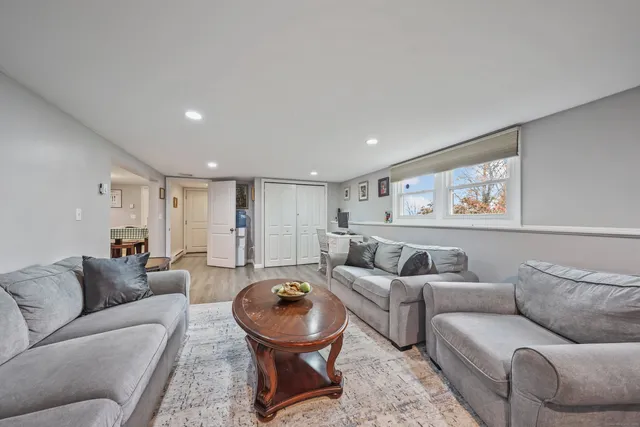 a living room with furniture and a table
