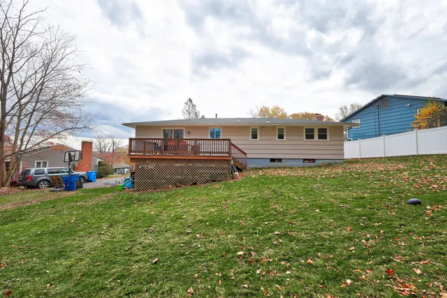 a view of a house with a back yard