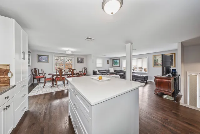 a view of kitchen center island and living room