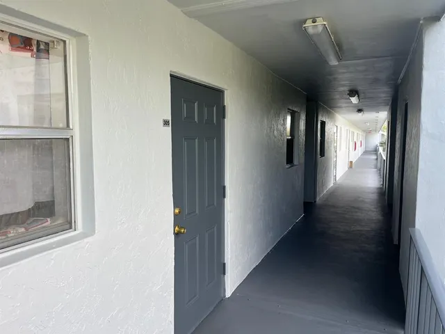 a view of hallway with stairs
