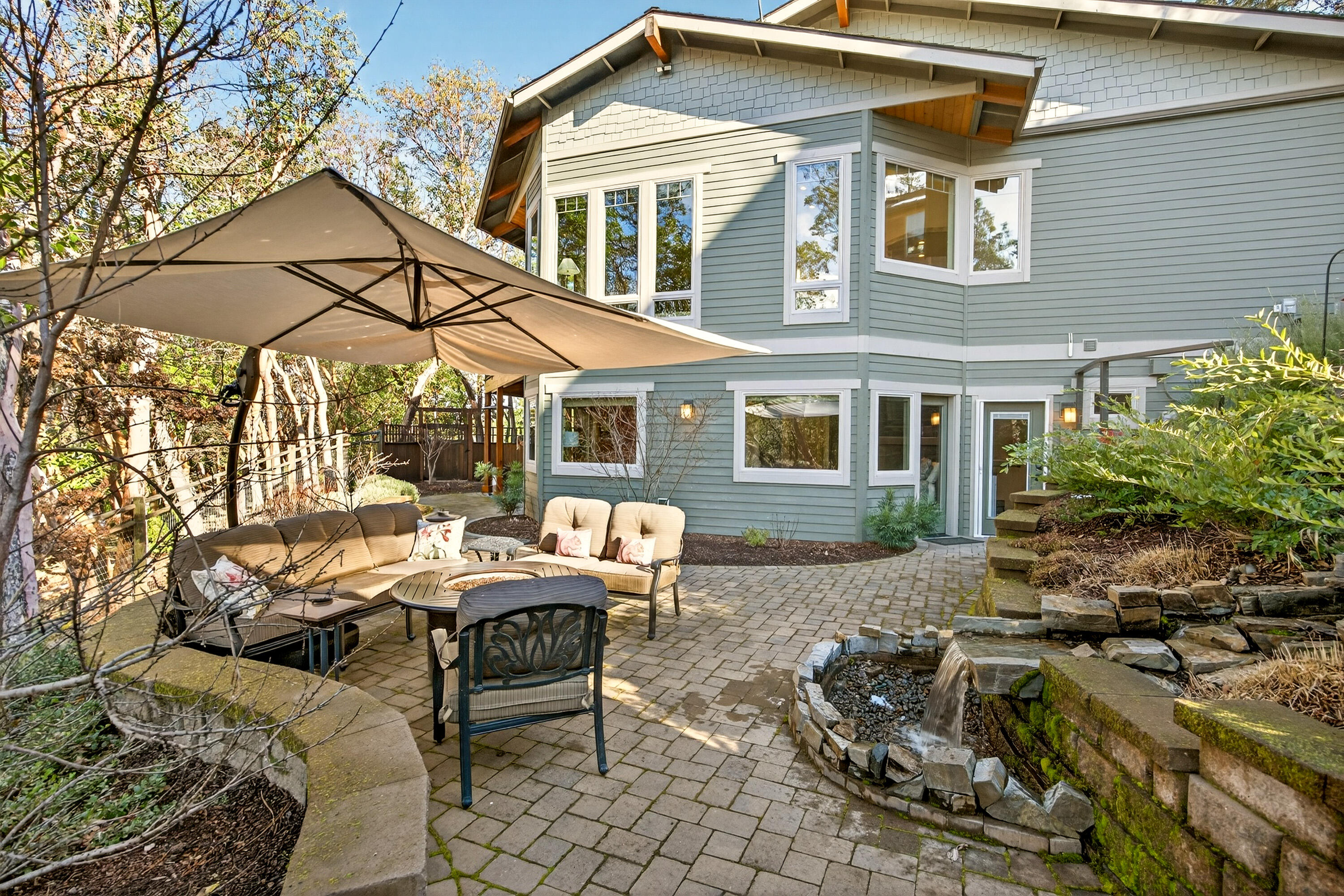 930 Granite Ridge Circle Jacksonville, OR 97530 - Photo 52 of 79 Paver patios and pathways meandering through the grounds.
