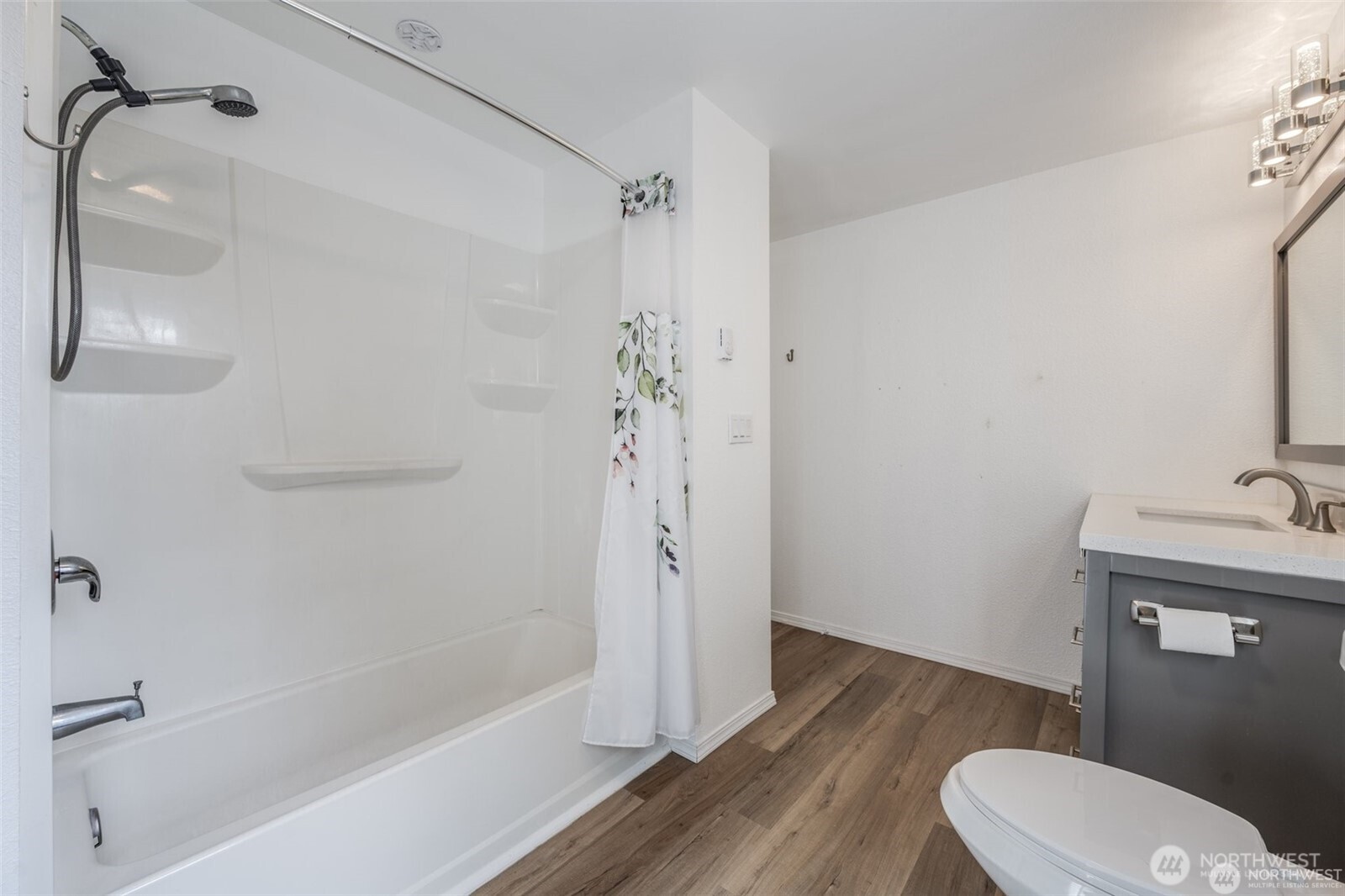 105 96th Street East Tacoma, WA 98445 - Photo 28 of 40 a bathroom with a granite countertop sink toilet and shower